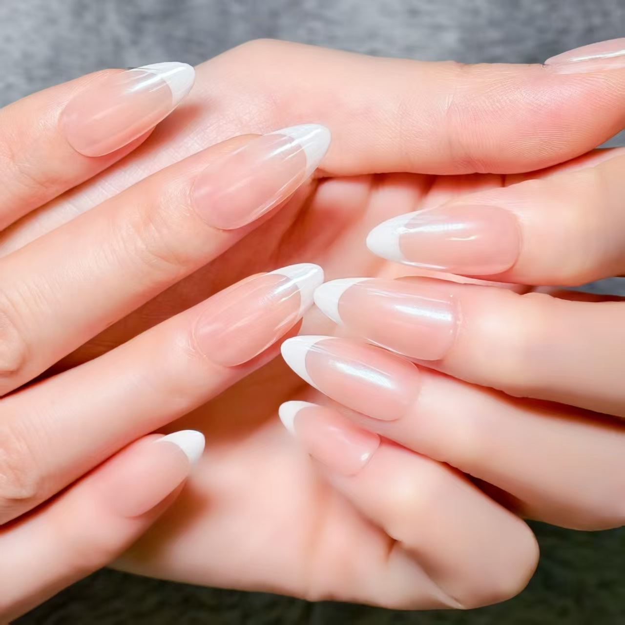 Classic French Manicure - Elegant Oval - Shaped Nails for All Occasions