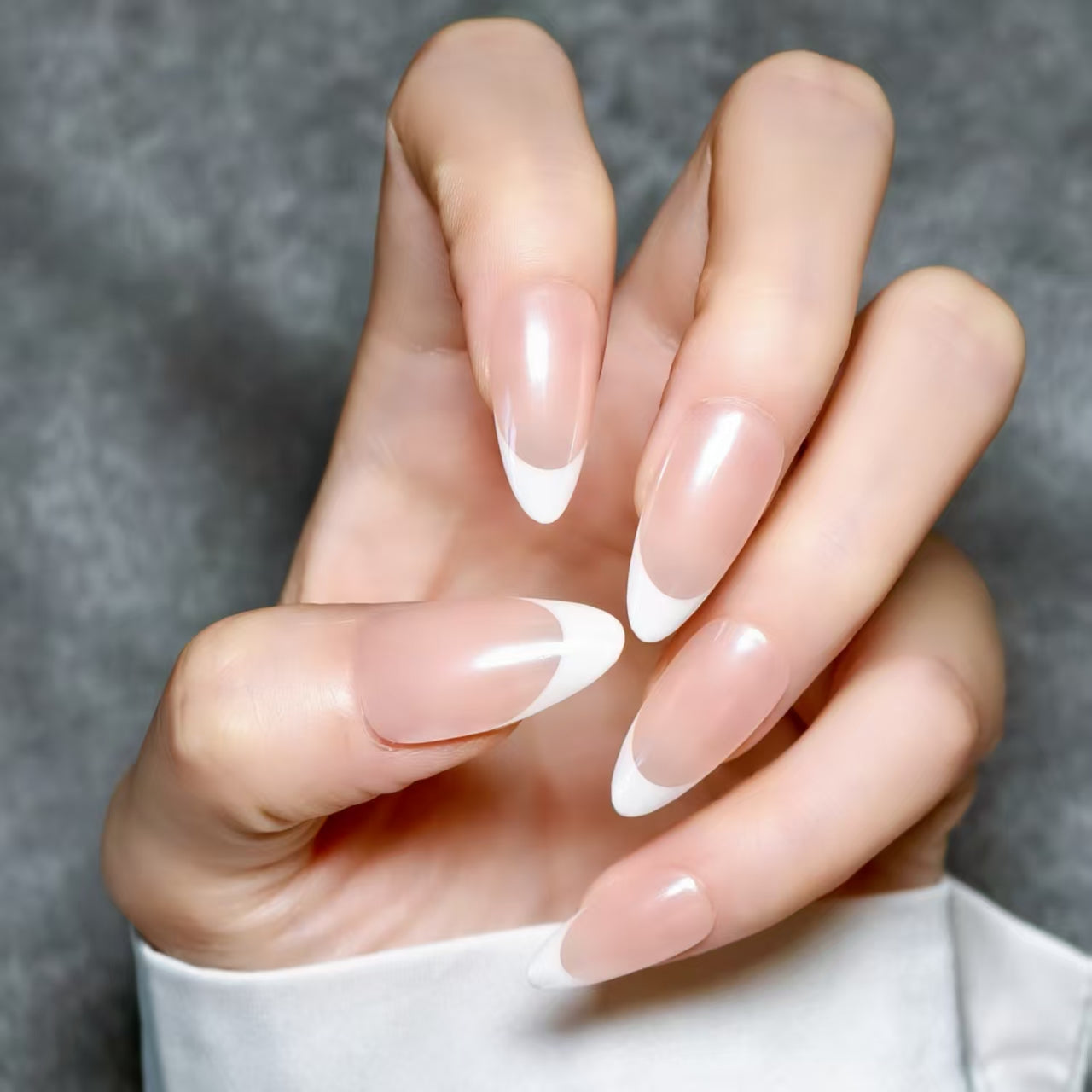 Classic French Manicure - Elegant Oval - Shaped Nails for All Occasions