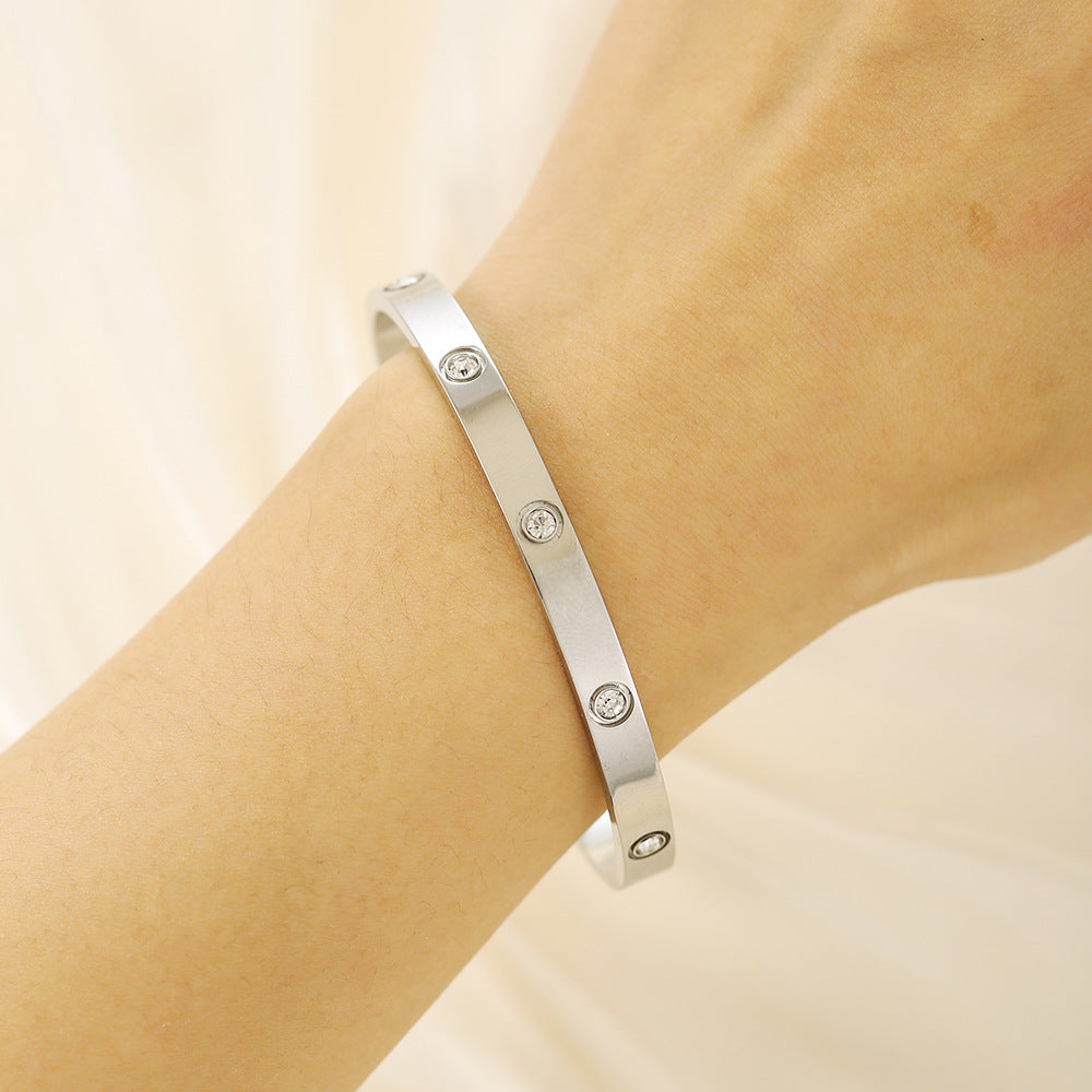 Simple and Elegant Diamond-Encrusted C-Shaped Bracelet