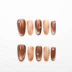 Gradient Brown Diamond-Accent Nails - Elegant Feather Background Manicure